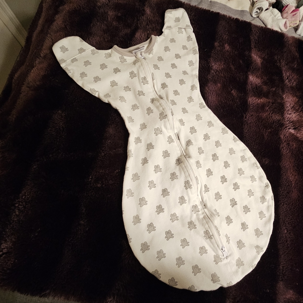 Transitional swaddle sack